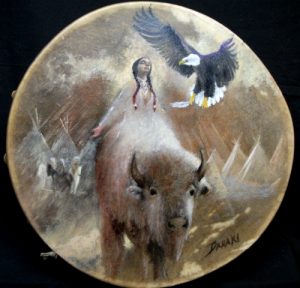 image représentant une femme sur un bizon